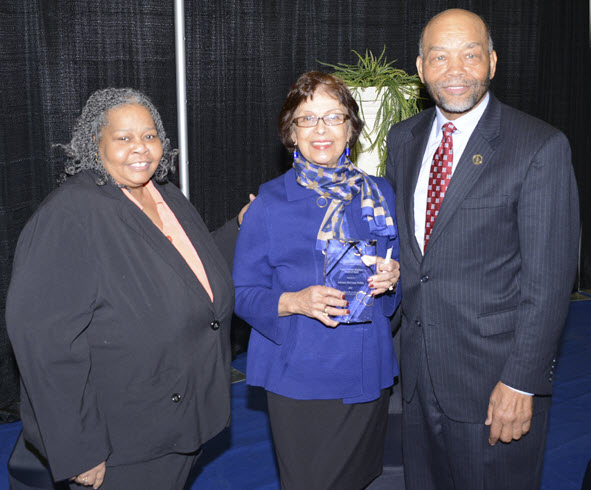 Dr. Miriam DeCosta-Willis (center) displays the Carter G. Woodson Award along with (L) Southwest Associate Director of the Honors Academy MaLinda Wade (Woodson Award program chair) and (R) Retired Southwest Associate Professor Clarence Christian (Woodson Award Program founder).