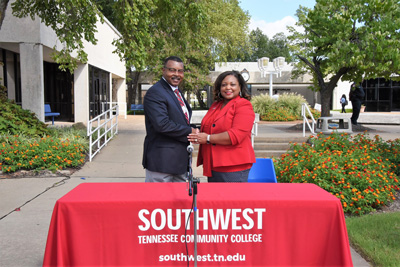 Roland Rayner, President of the Tennessee College of Applied Technology at Memphis, and Dr. Tracy D. Hall, President of Southwest Tennessee Community College, sign an articulation agreement that enables TCAT-Memphis students to matriculate to Southwest where they can earn an Associate of Applied Science degree in Automotive Technology faster and possibly tuition-free with Tennessee Reconnect scholarships. The colleges have agreements in the pipeline that will enable TCAT-Memphis students to transfer credit to Southwest to earn advanced credentials in computer science and nursing.
