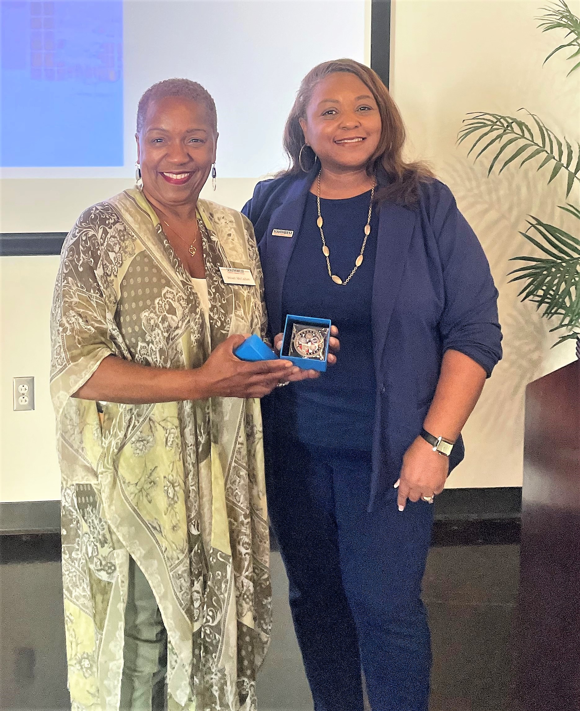 Attached Photo: Velvet McCallum receives her Tennessee Board of Regents’ Chancellor’s Commendation for Military Veterans Challenge Coin from Southwest Tennessee Community College President Tracy D. Hall at Southwest’s Veteran Employee Appreciation and Recognition Event Nov. 8, 2022.  Photo credit: Southwest Tennessee Community College