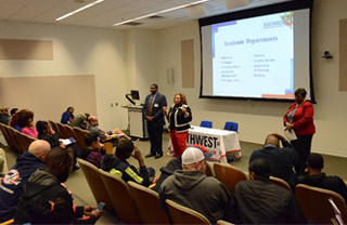 Dr. Robin Cole, President Tracy D. Hall, and Vice President of Student Services Jacqueline Faulkner address students from Vatterott and L’Ecole Culinaire in the Bert Bornblum Library auditorium Dec. 20.
