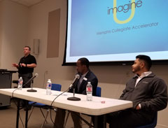 Mike Hoffmeyer discusses the imagineU program as Rory Thomas and Luiz Saucedo listen. 