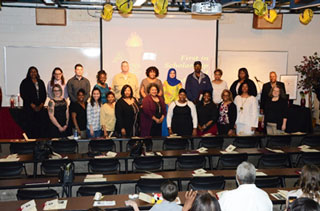 New ASL members pose for a group photo to commemorate their induction. 