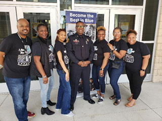Memphis Police Department officers and representatives stand in front of Southwest’s Nursing, Natural Sciences, and Biotechnology Building where Blue Path Day was held. 
