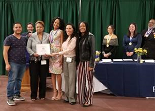 Upsilon Delta Chapter officers and student members display their honors at the 2019 Tennessee Regional Convention.