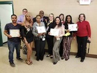 Upsilon Delta Chapter officers and student members display their honors at the 2019 Tennessee Regional Convention. 