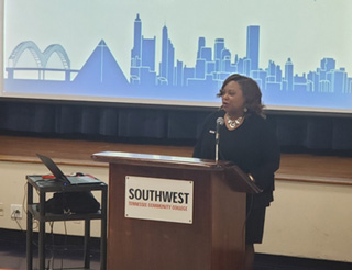 President Tracy D. Hall addresses mentors at the tnAchieves orientation breakfast.