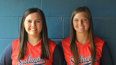 Saluqi softball players Jennie Bryant and MaKayla Pugh