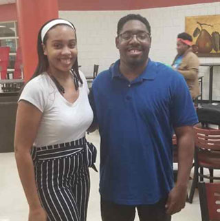 Mentor Lekeyantia Naylor (at left) meets her mentees at the D.R.E.A.M. Café Social on the Macon Cove Campus.