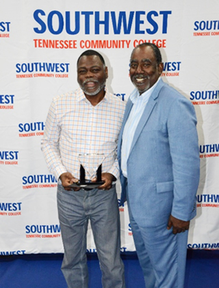 PASO President Edward Ashworth (right) presents Ron Claxton the Professional Administrative Support Leadership Award.