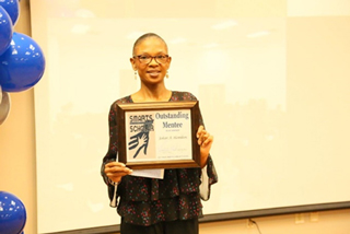 Student Johari Hamilton was awarded the SMARTS Outstanding Mentee award.