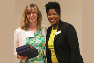Languages and Literature Department Adjunct Instructor Janet Rosenthal receives her appreciation award from Dean of Humanities, Social Sciences and Mathematics Dr. LaDonna Young at the adjunct awards dinner held at the Macon Cove Campus. . 