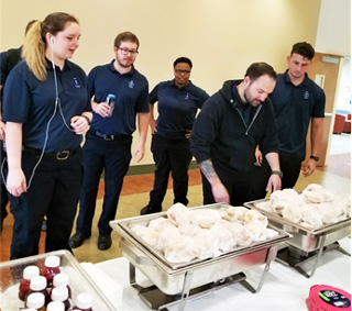 Maxine A. Smith Center EMT students grabbed breakfast before completing their State Licensure Application.