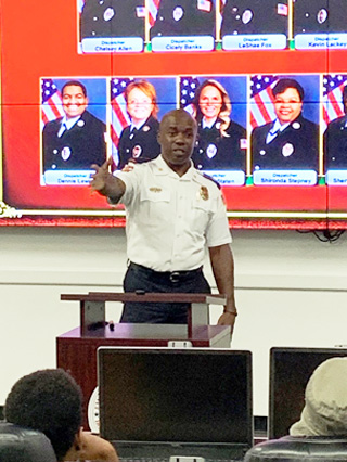 Shelby County Fire Chief Alvin Benson talked to rally participants about paramedic and firefighter careers.