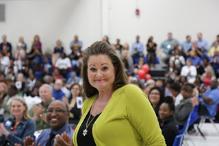 Sara Tinker and Phillip Johnson read their special “I Am” poem at convocation.