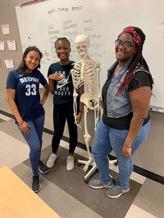 Eighth-graders Ximena Villa of White Station Middle School and Adysun Jones of Kate Bond Middle School studied STEM lessons with the help of facilitator Rahni Stuwart during Eureka Summer Camp at the Union Avenue Campus.