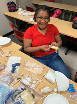 Morgan McClain, a ninth-grade student at Germantown High School, works on building a maze using various household products. She enjoyed the STEM classes and wants to someday be a dermatologist.