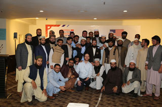 Dr. Christopher Hastings (front row, center) gathers with English teachers from Pakistani Madrasas.