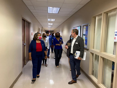 Physical Plant Director Jonathan Welden gives President Tracy D. Hall and governance and student leaders a tour of the safety installations at the Union Avenue campus. 