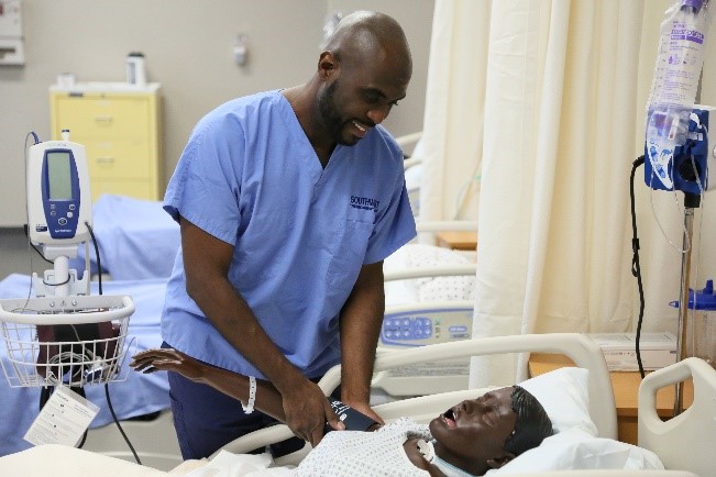 Southwest nursing student Max Prophete in training on the Union Avenue Campus.