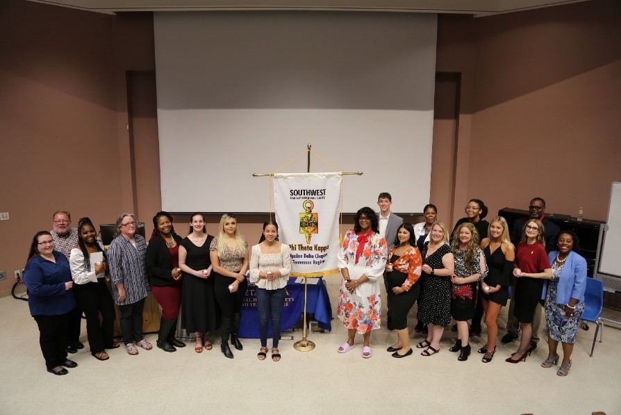 New members and their chapter leaders at the Phi Theta Kappa Upsilon Delta Chapter induction ceremony April 24, 2022. 