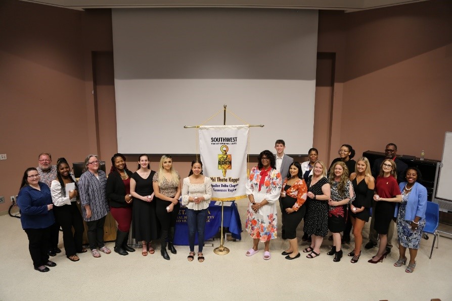 New members and their chapter leaders at the Phi Theta Kappa Upsilon Delta Chapter induction ceremony April 24, 2022.