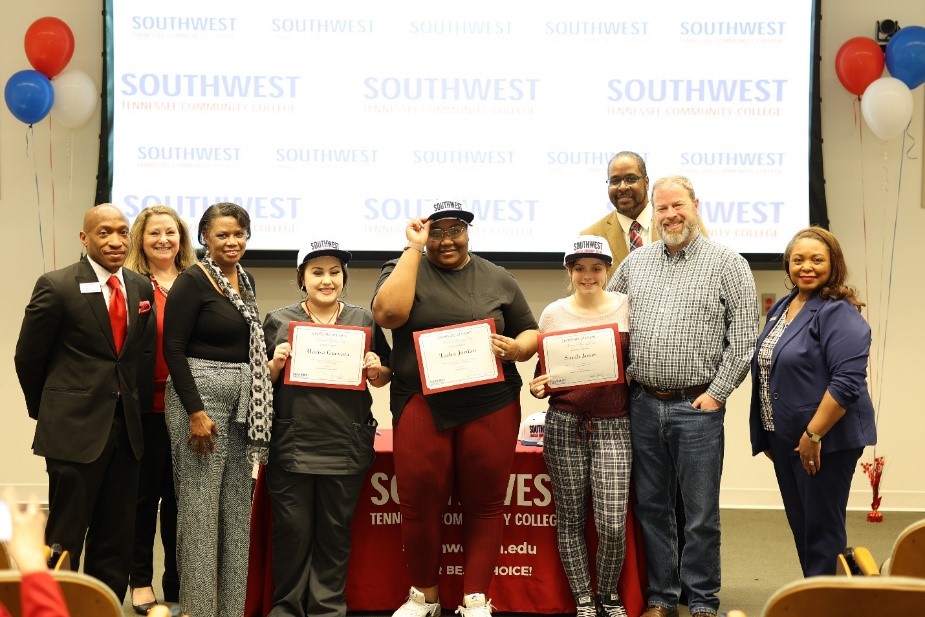 Faculty, staff and parents surround Saluqi freshmen during Southwest’s inaugural National Signing Day April 14, 2022.