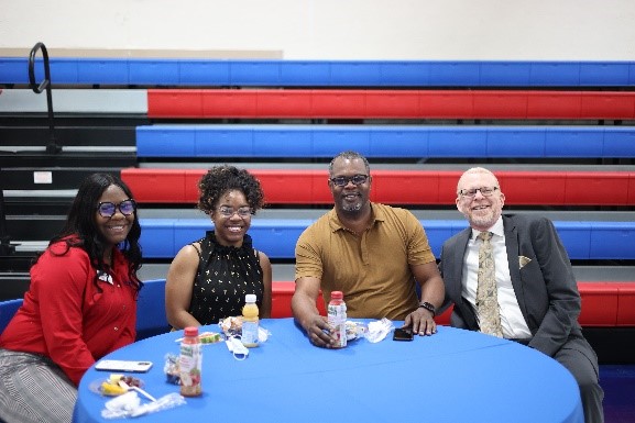Faculty and staff enjoyed catching up before the start of fall semester at the 2022 Fall Convocation Aug. 18, 2022. 
