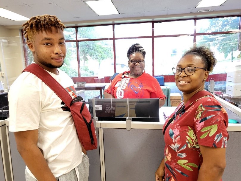 Kristy Dallas Johnson (right), mother of student José Johnson said, “Saluqi Saturday was an efficient and helpful way to get her son registered.” 