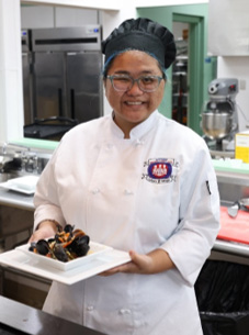 Rachel Drees finds joy in cooking and baking for friends and family. That joyous passion is what landed her at Southwest, excited and ready to pursue an associate degree in hospitality management with a concentration in culinary arts.  “Each day I get up is for my grandmother. She was the baker in the family and when her health started to decline, I stepped up and started baking for her, especially during the holidays,” Drees said. “I knew in high school that I wanted to go to college for culinary arts, so me and my parents started searching for programs that were offered and Southwest was truly the best choice for me.” Drees said Southwest’s financial aid assistance through the Tennessee Promise scholarship played a major part in choosing the college.   Drees’ comfort in the kitchen is natural. She says baking for the holidays, birthdays, anniversaries and even creating her brother’s wedding cake, was, literally a piece of cake for her. “The more cakes I made, the more I realized how much I loved how baking incorporated a lot of artistic skills,” she said.  Southwest has become a beacon for Drees and her creativity in the classroom. She said the different dishes she has created through the guidance of Southwest’s culinary and hospitality management instructor Chef Steven Leake, has given her the hands-on experience and culinary skills she needs to succeed.   “Chef Leake has been great in instructing his students in a wide variety of culinary expertise,” Drees said. “He provides me with great feedback and the best part about it all, is that we are having fun in the classroom while we learn.”  Drees will graduate in Spring 2023. She plans to transition from working at Tacos4Life to working at a bakery or cakeshop.   In the meantime, you can find her in her family’s kitchen keeping her grandmother’s legacy alive. For more information about Southwest’s Culinary Arts Program, click here. 