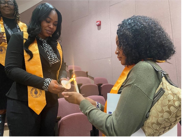 PTK inductees at their candlelight ceremony on Dec. 8.